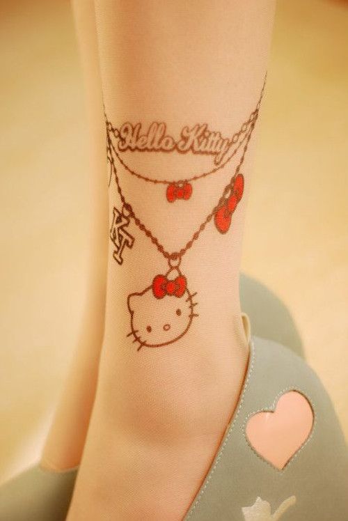 Hello Kitty Chain Locket Tattoo On Leg