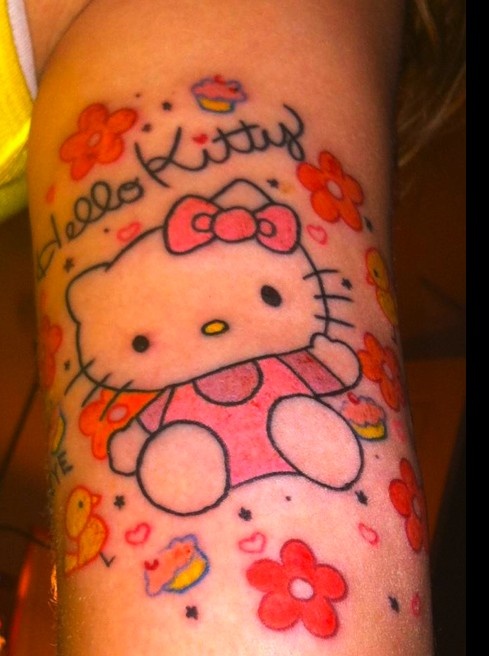 Hello Kitty Tattoo On Left Bicep