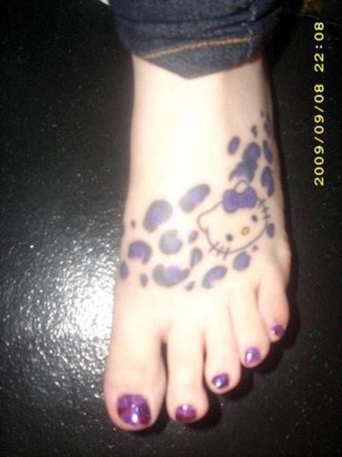 Hello Kitty Tattoo On Left Foot