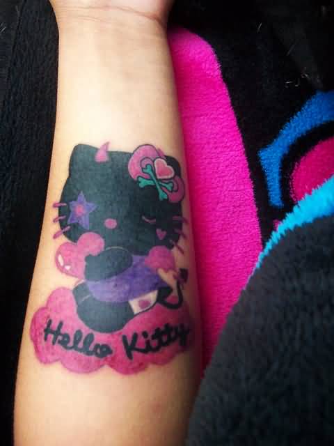 Hello Kitty Tattoo On Left Forearm