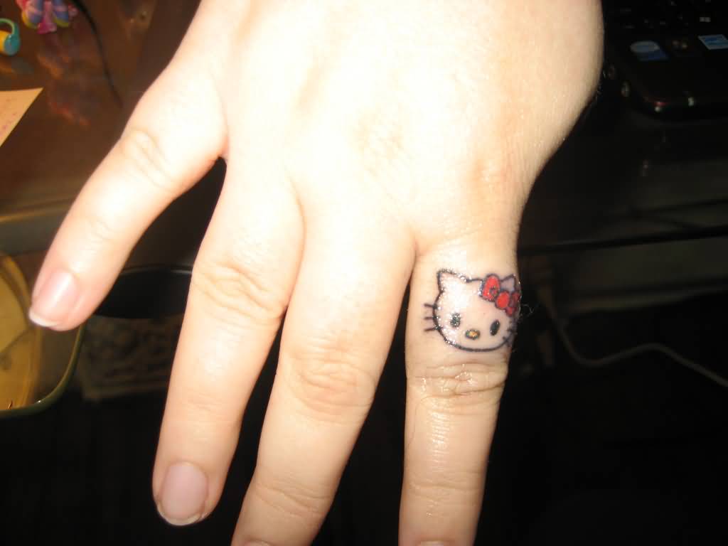 Hello Kitty Tattoo On Small Finger