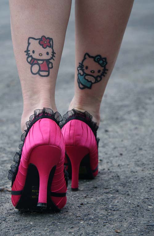Hello Kitty Tattoos On Girl Back Legs