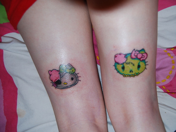 Hello Kitty With  Bow Tattoos On Legs