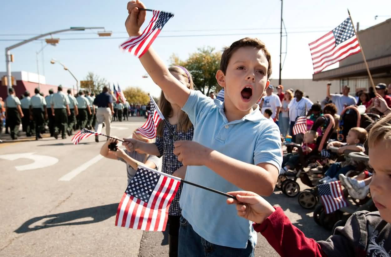 Kids Cheers At The Veterans Day Parade In Downtown Killeen, Texas