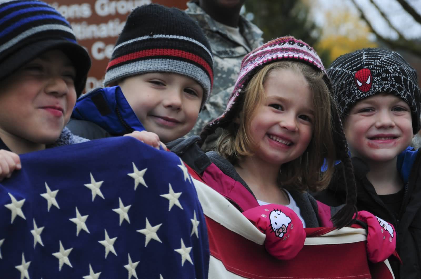 Kids With American Flag Waiting For Veterans Day Parade