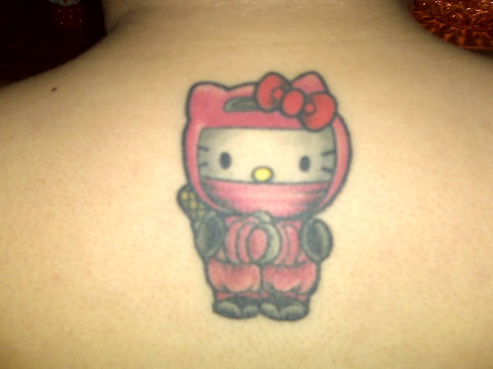 Ninja Hello Kitty Tattoo On Man Upper Back