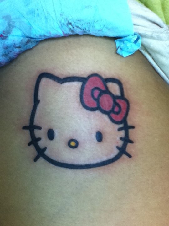 Outline Hello Kitty Tattoo On Side Rib by Guttaboi D4msenc