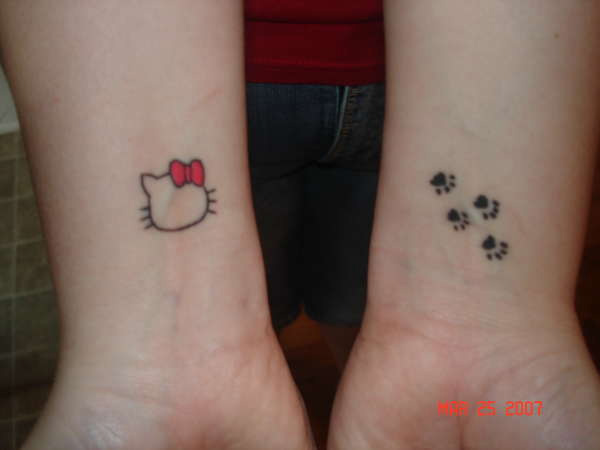 Outline Hello Kitty Tattoos On Wrists
