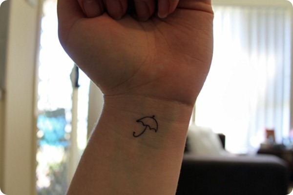 Outline Simple Umbrella Tattoo On Left Wrist