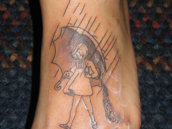 Outline Umbrella Girl Tattoo On Left Foot