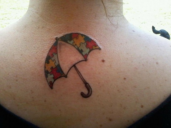 Puzzle Umbrella Tattoo On Girl Upper Back