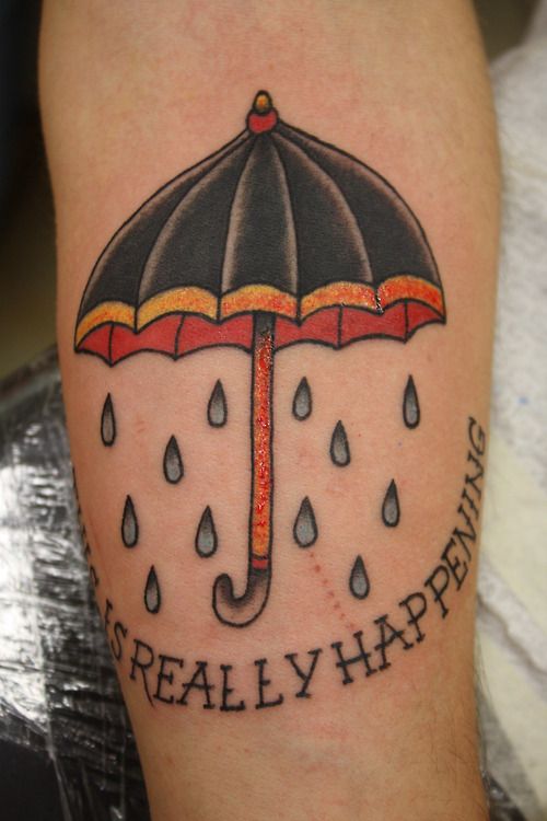 Really Happening Umbrella Tattoo On Left Arm