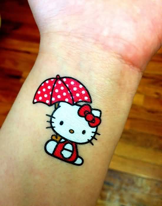 Red And White Hello Kitty Tattoo On Wrist