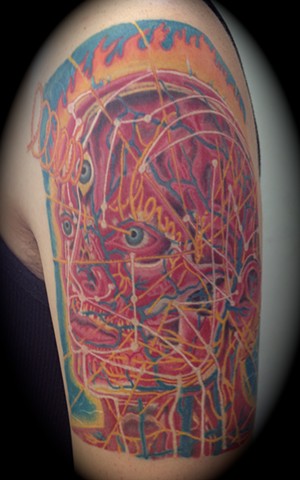 Red Ink Alex Grey Tattoo On Left Shoulder