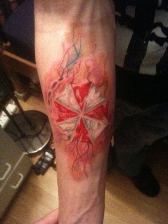 Resident Evil Umbrella Tattoo On Forearm