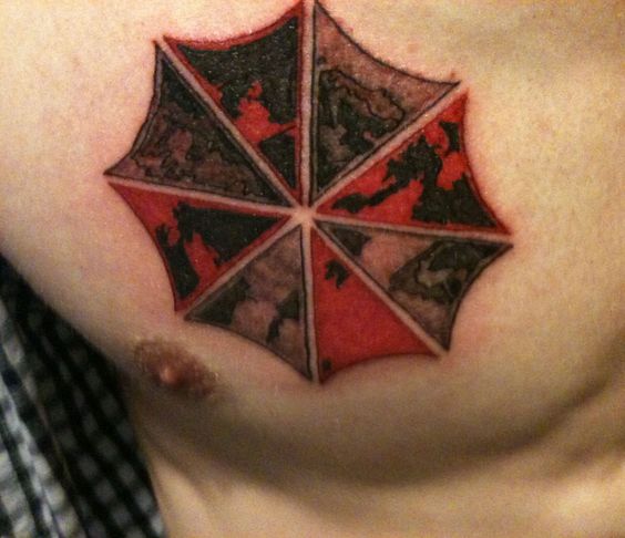 Resident Evil Umbrella Tattoo On Man Chest