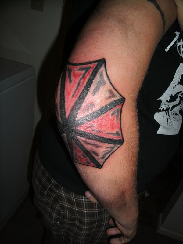 Resident Evil Umbrella Tattoo On Right Elbow