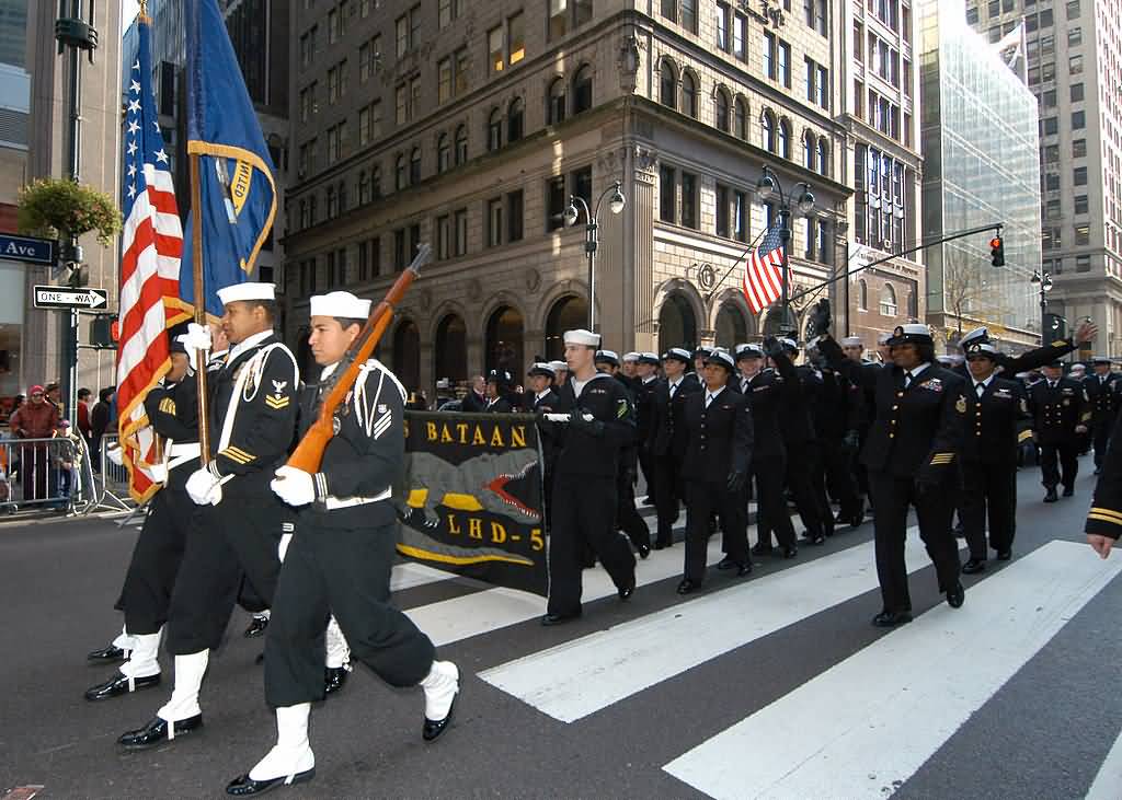 Sailors March And Wave To Parade Onlookers During New York's Annual Veterans Day Parade
