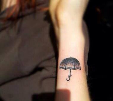 Simple Umbrella Tattoo On Left Wrist