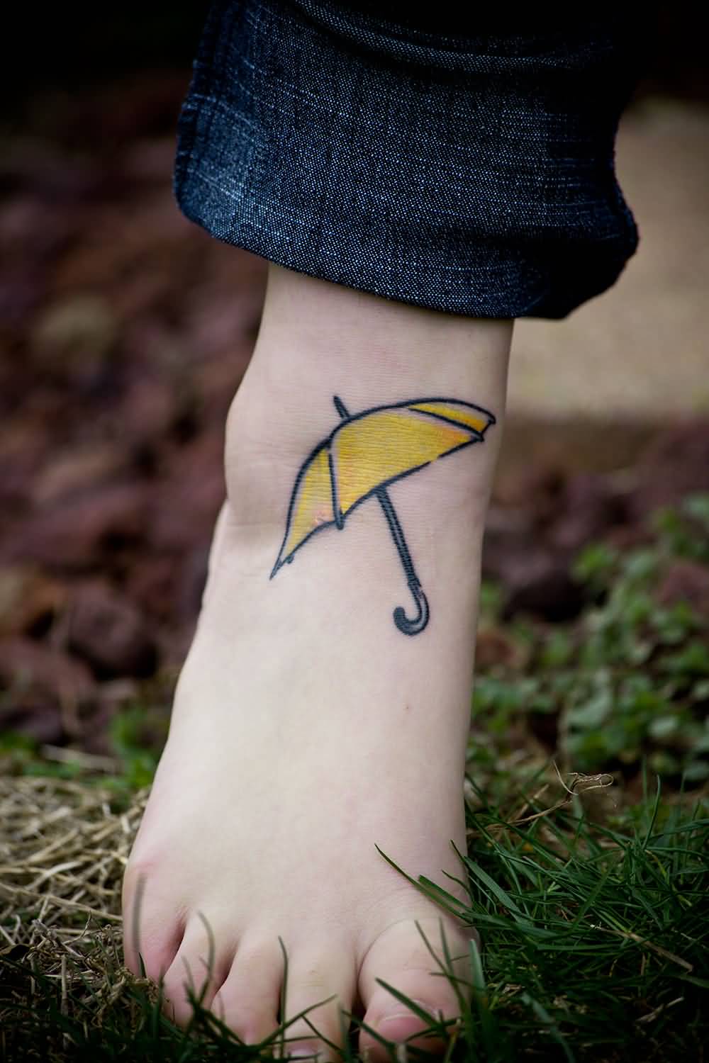 Simple Umbrella Tattoo On Right Foot