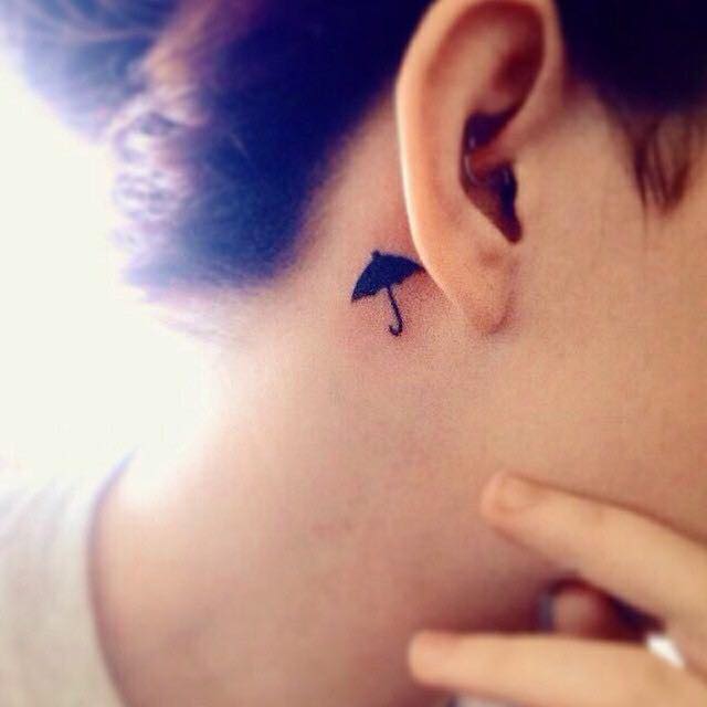 Small Black Umbrella Tattoo Behind The Ear