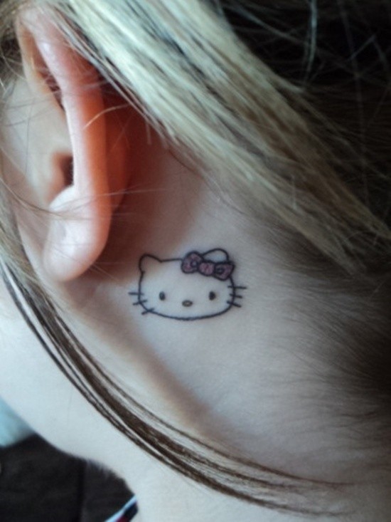 Small Hello Kitty Tattoo On Behind The Ear