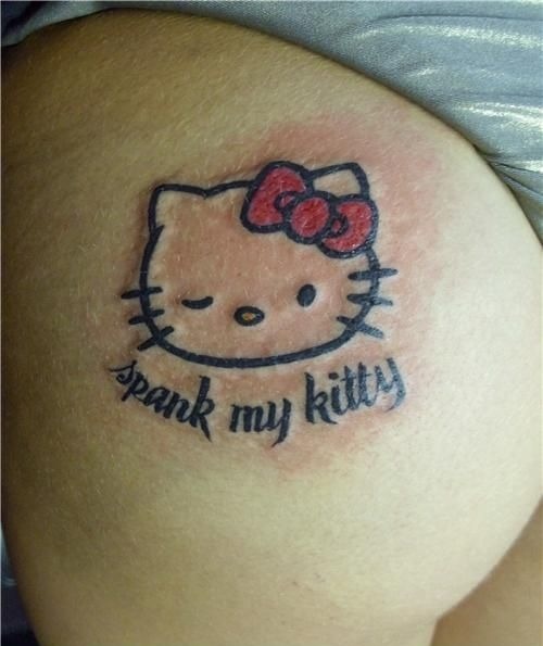 Spank My Kitty Tattoo On Side Leg