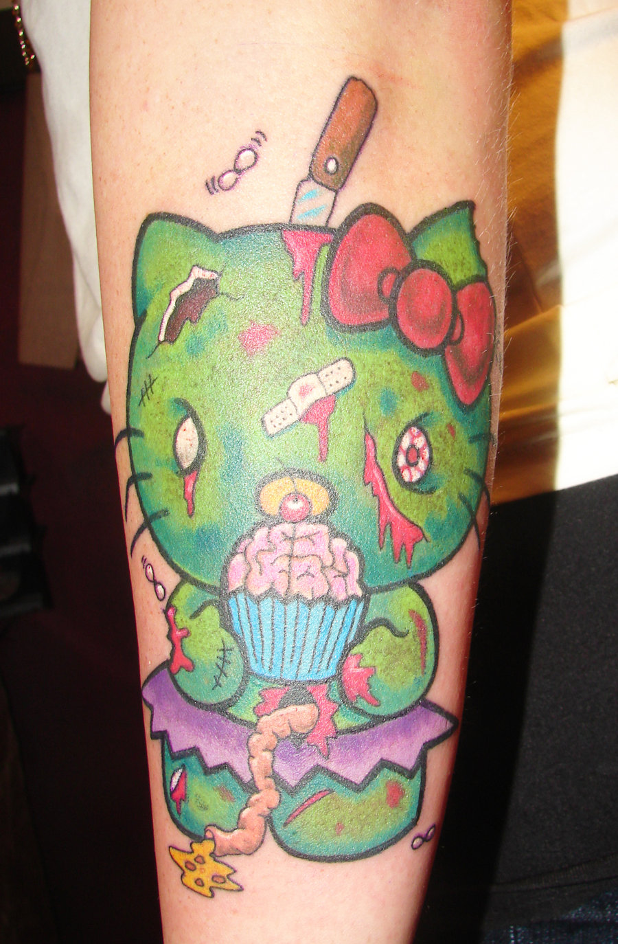 Zombie Hello Kitty Tattoo On Arm by Asuss06