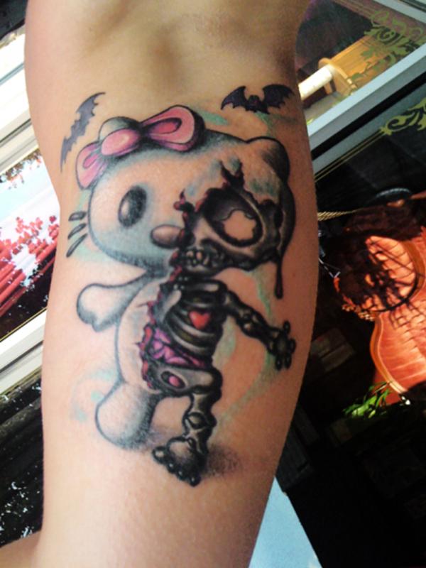 Zombie Hello Kitty Tattoo On Inner Bicep