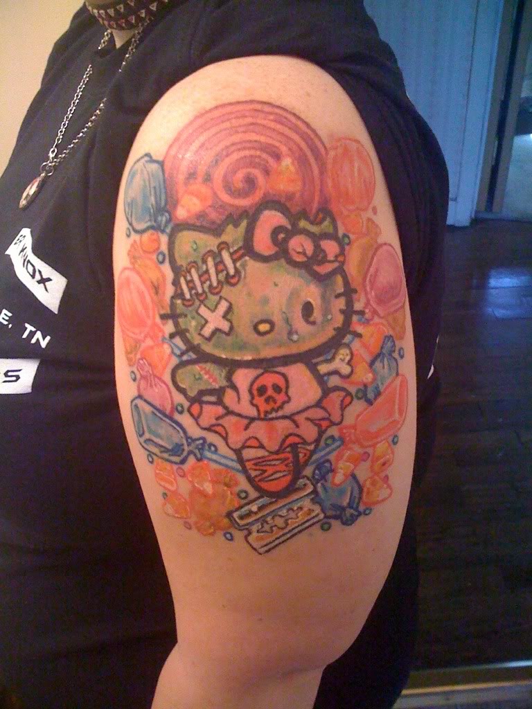 Zombie Hello Kitty Tattoo On Left Shoulder by Xxhidefreakxx
