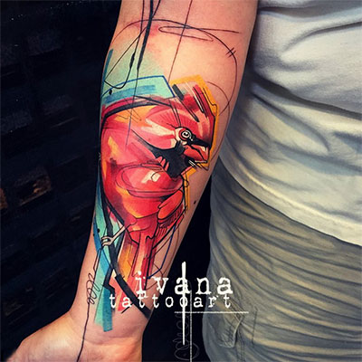 Abstract Color Cardinal Tattoo On Forearm