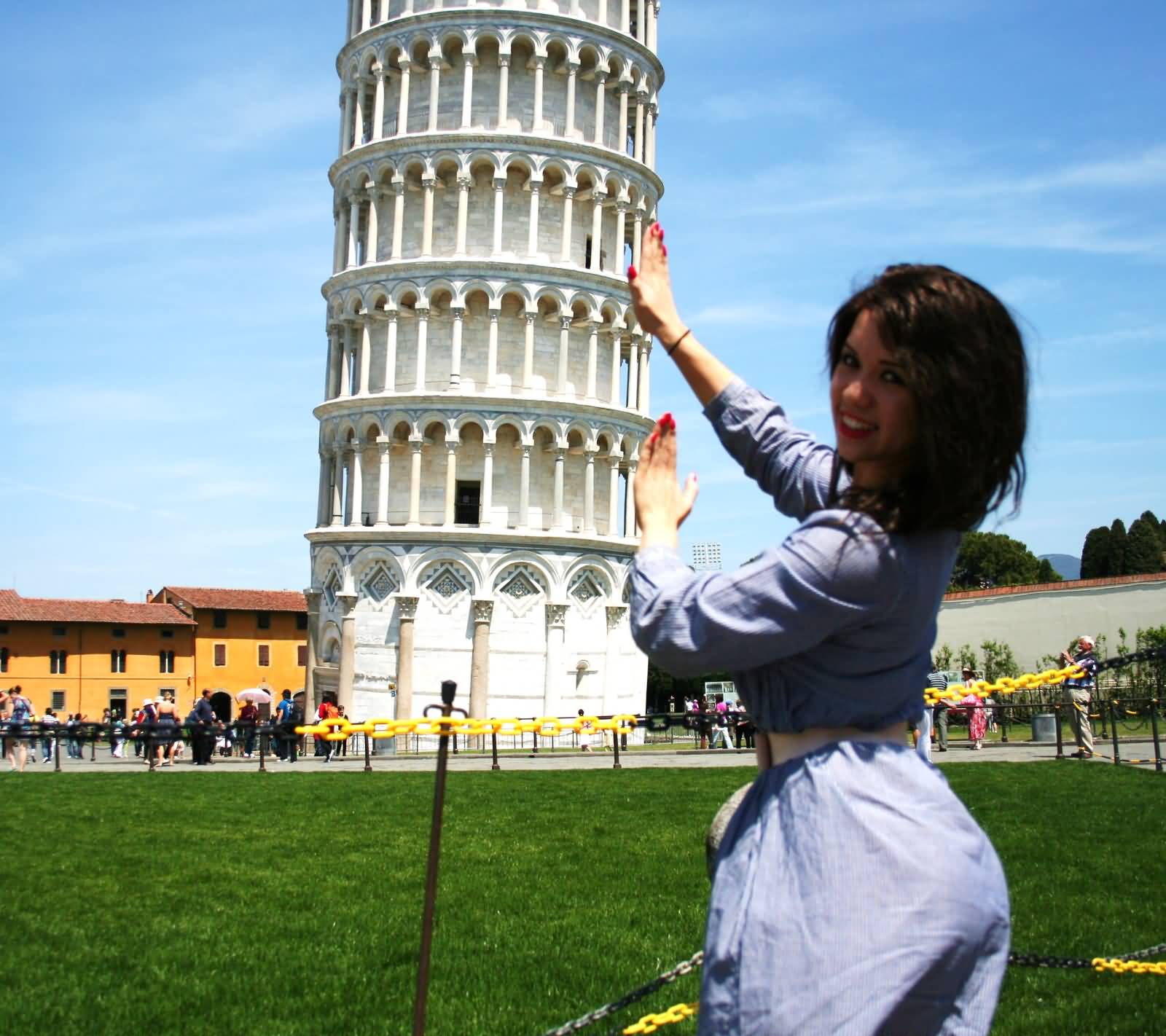Beautiful Girl Posing With Leaning Tower Optical Illusion Picture