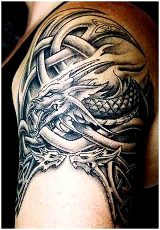 Black And Grey Celtic Dragon Tattoo On Left Shoulder