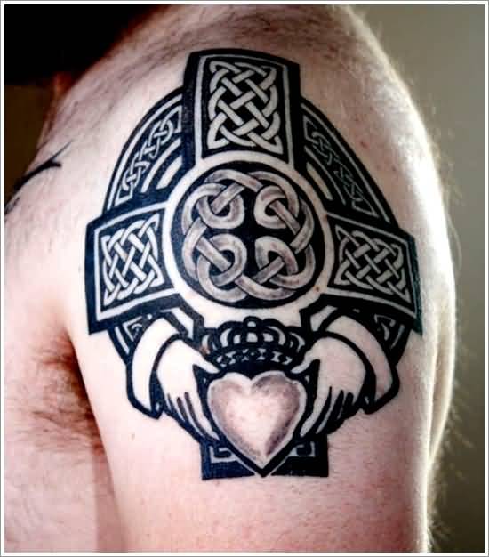 Black And Grey Celtic Tattoo On Man Left Shoulder