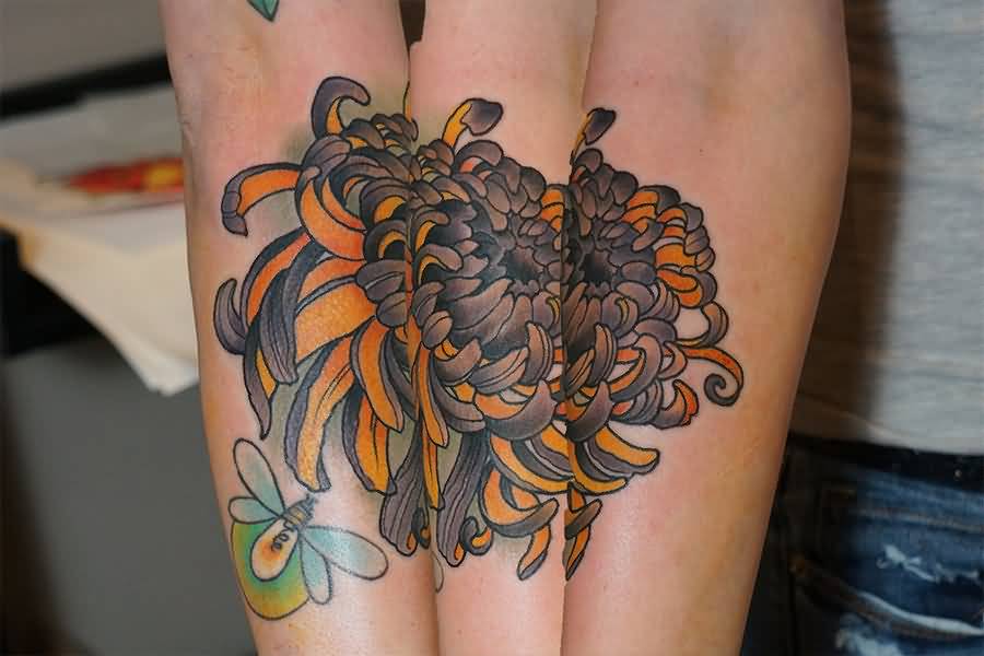 Black And Orange Ink Chrysanthemum Tattoo On Sleeve