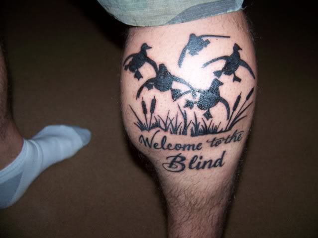Black Ink Flying Duck Tattoos On Leg Calf