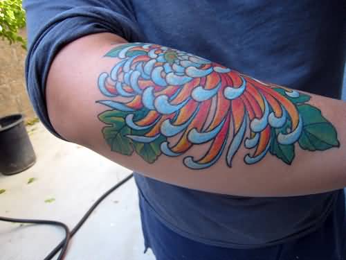 Blue Ink Chrysanthemum Tattoo On Right Sleeve