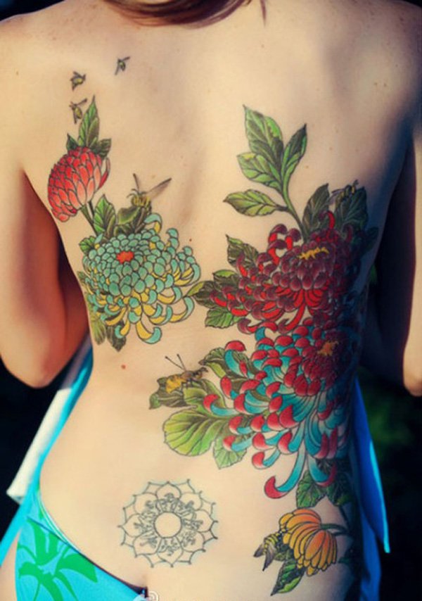 Colored Chrysanthemum Tattoo On Girl Full Back