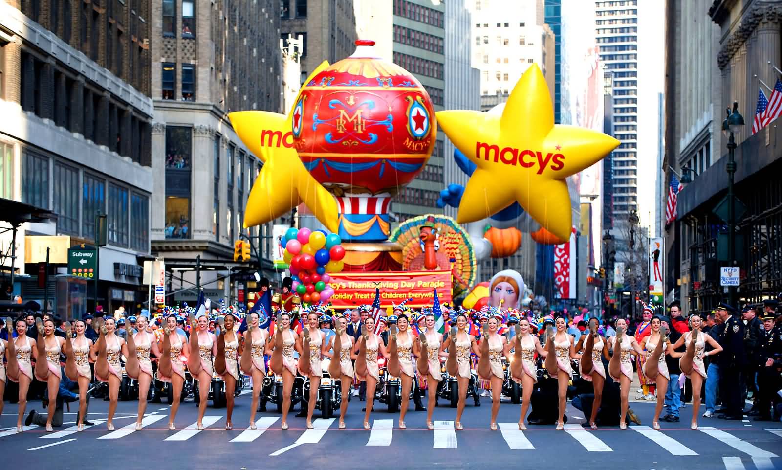 Dancing Girls In Front Of Float During Thanksgiving Parade
