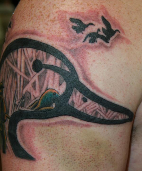 Duck Head Tattoo On Right Shoulder