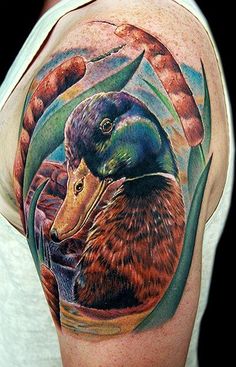 Duck Tattoo On Left Shoulder by Cecil Porter