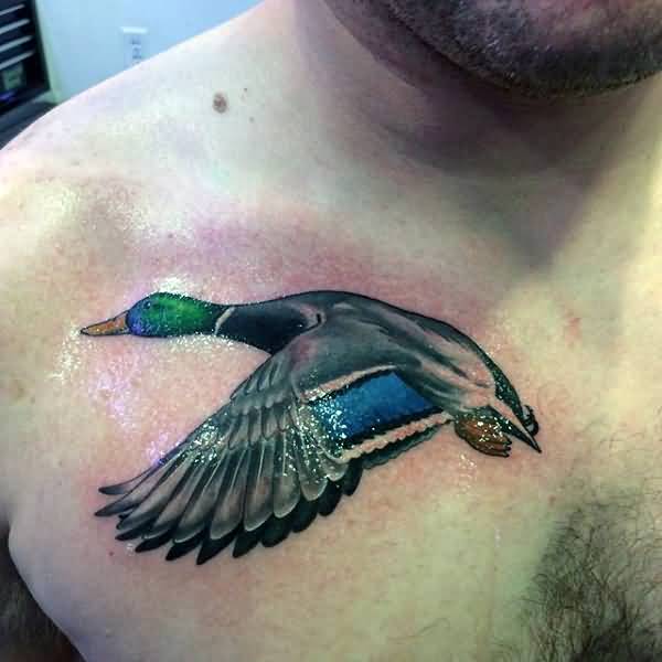 Flying Duck Tattoo On Man Front Shoulder