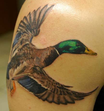 Flying Duck Tattoo On Right Shoulder