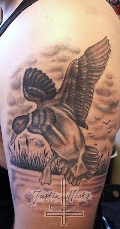 Flying Grey Ink Duck Tattoo On Left Half Sleeve