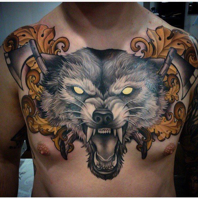 Grey Ink Wolf Tattoo On Man Chest by Kevin Dickinson