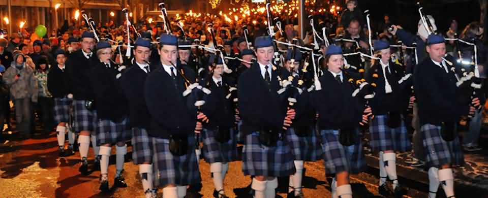 Group Of Bagpipers Performing Ahead Of St. Andrew’s Day Celebration Parade