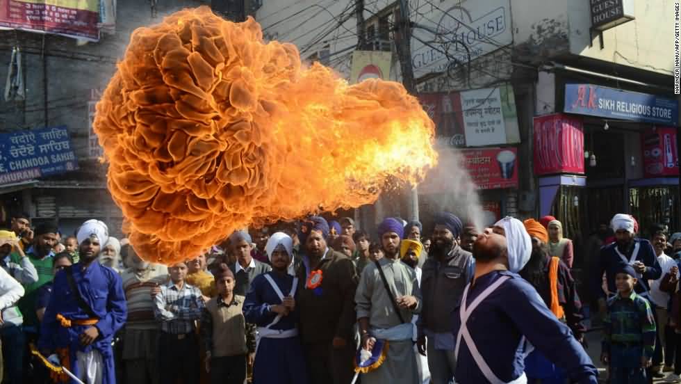 Indian Sikh Nihang Warrior Fire Breathing In Celebration Of Guru Nanak Birthday
