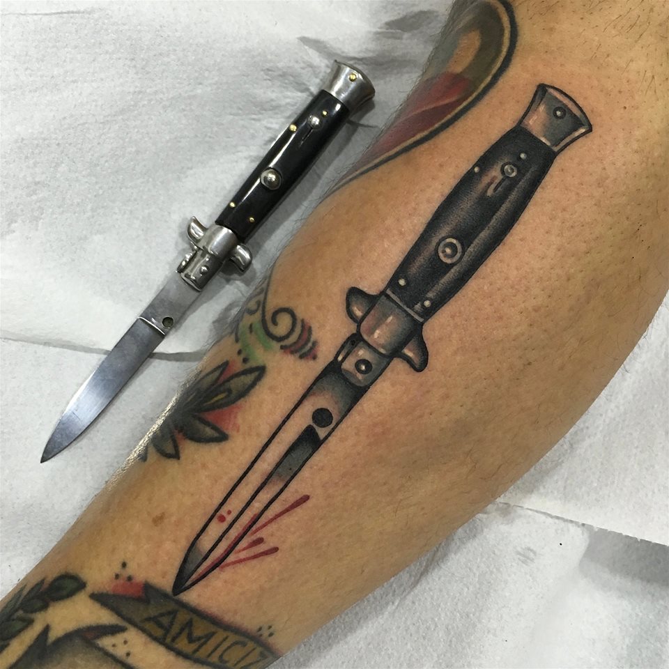 Knife Weapon Tattoo On Leg by Fabio Onorini
