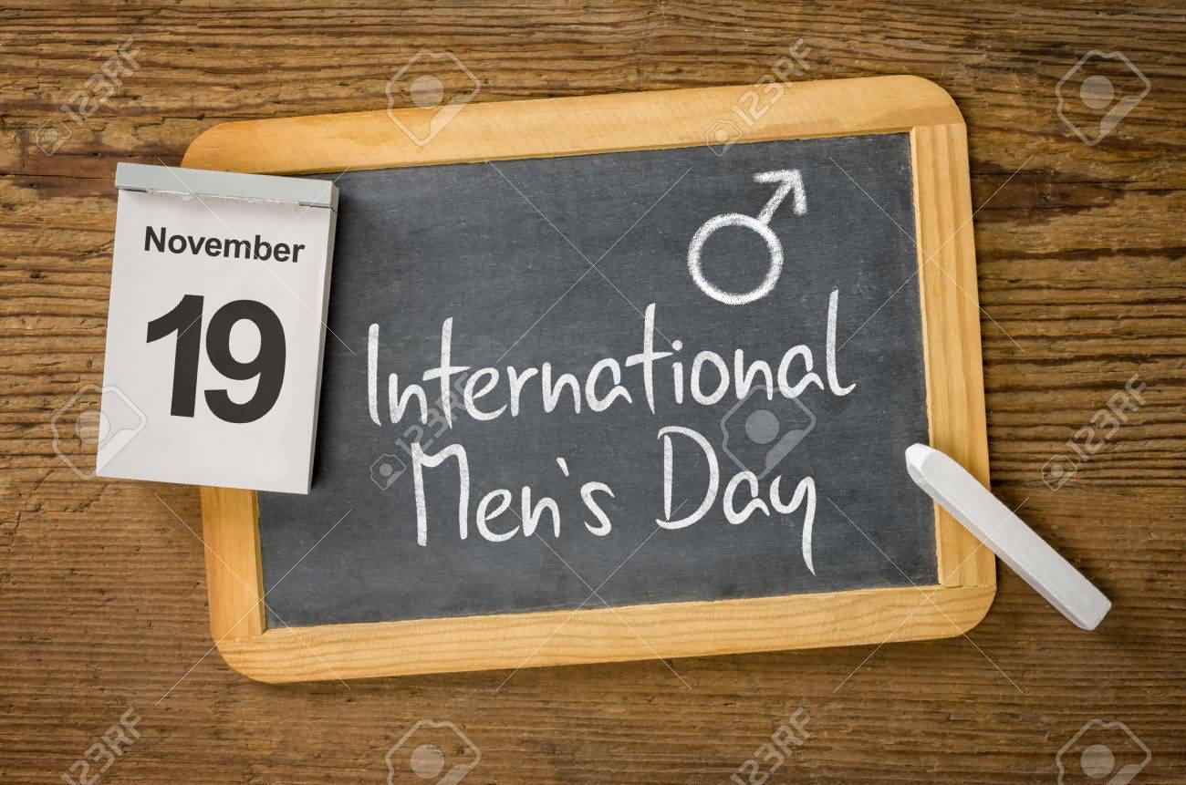 November 19 International Men's Day Written On Black Board