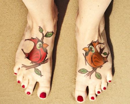 Red And Tan Cardinal Birds Tattoos On Feet